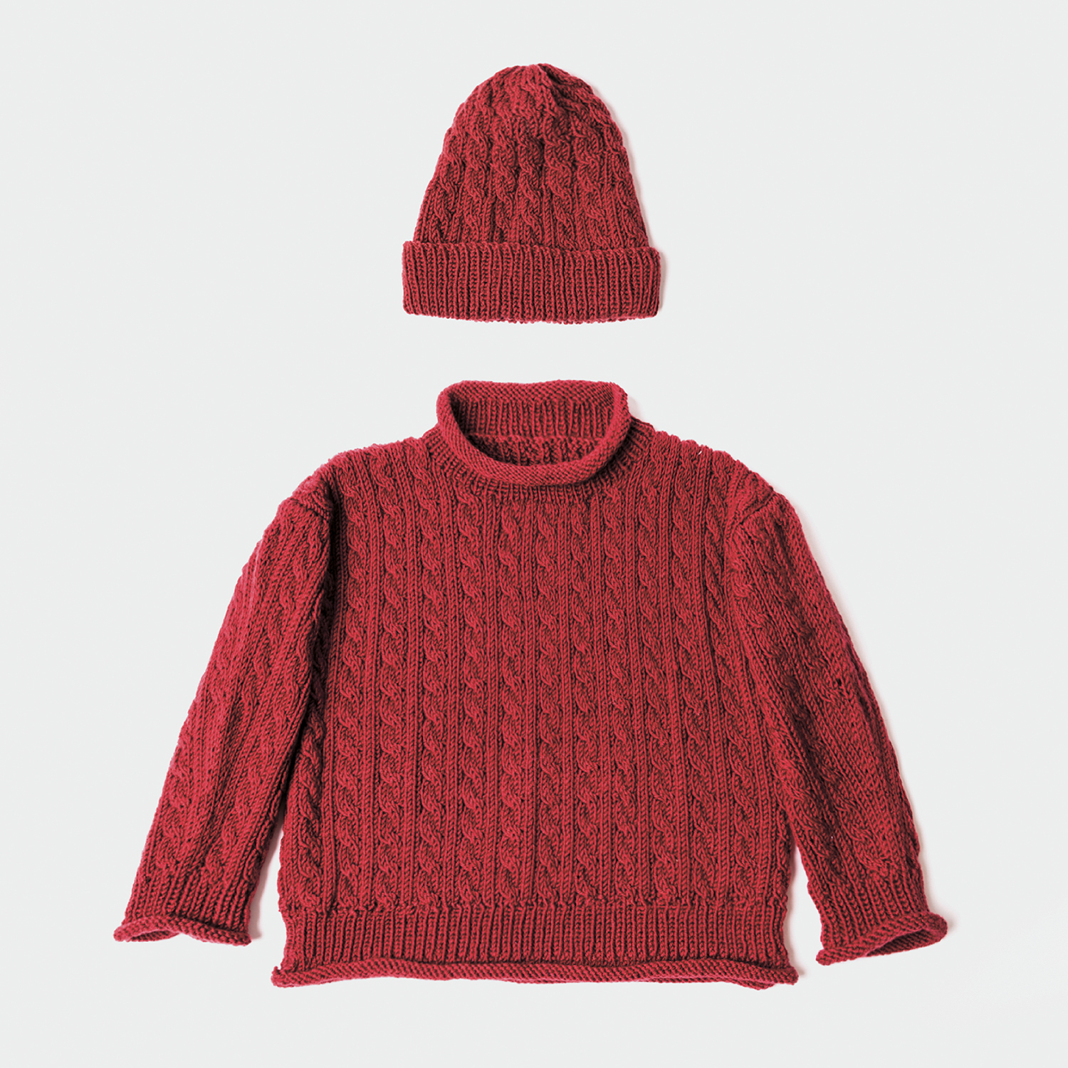 Strickanleitung Zopfpullover mit passender Mütze von Rico Design