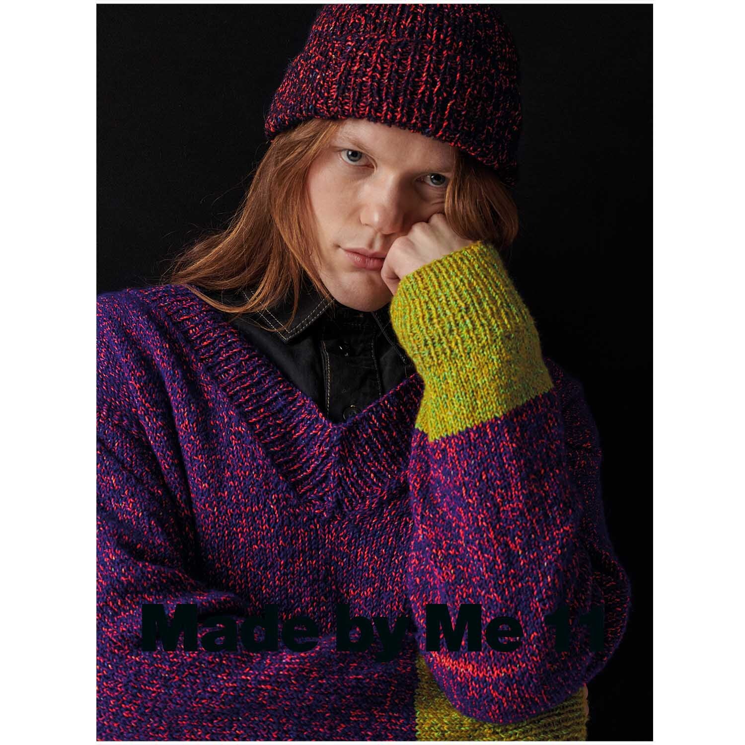 Fashion Fluorino dk: Person in gestricktem Pullover und Mütze, mit lebendigen Farben und Textur.