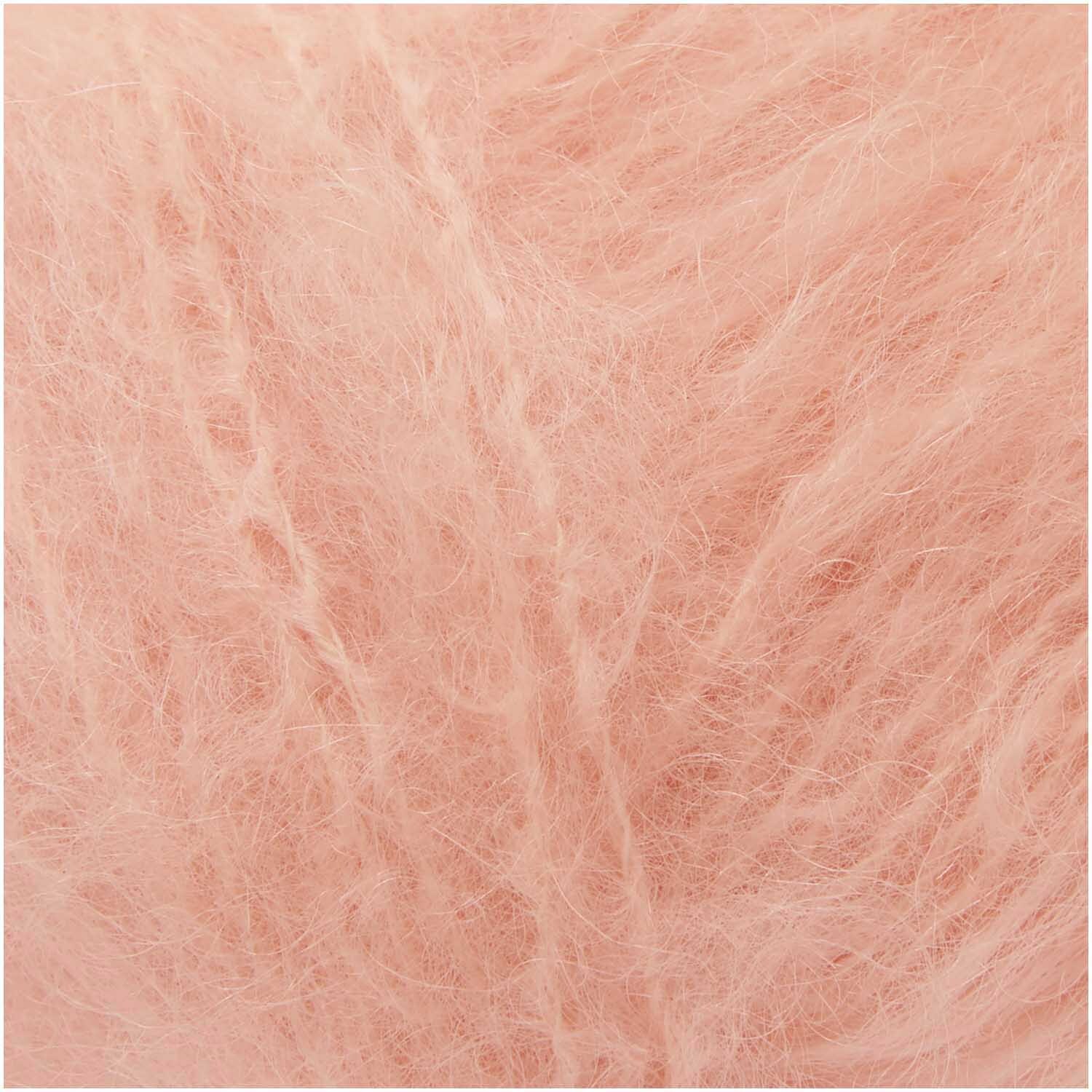 Fashion Mohair Merino Chunky: Weiches, lachsfarbenes Garn von Rico Design, ideal für Strickprojekte.