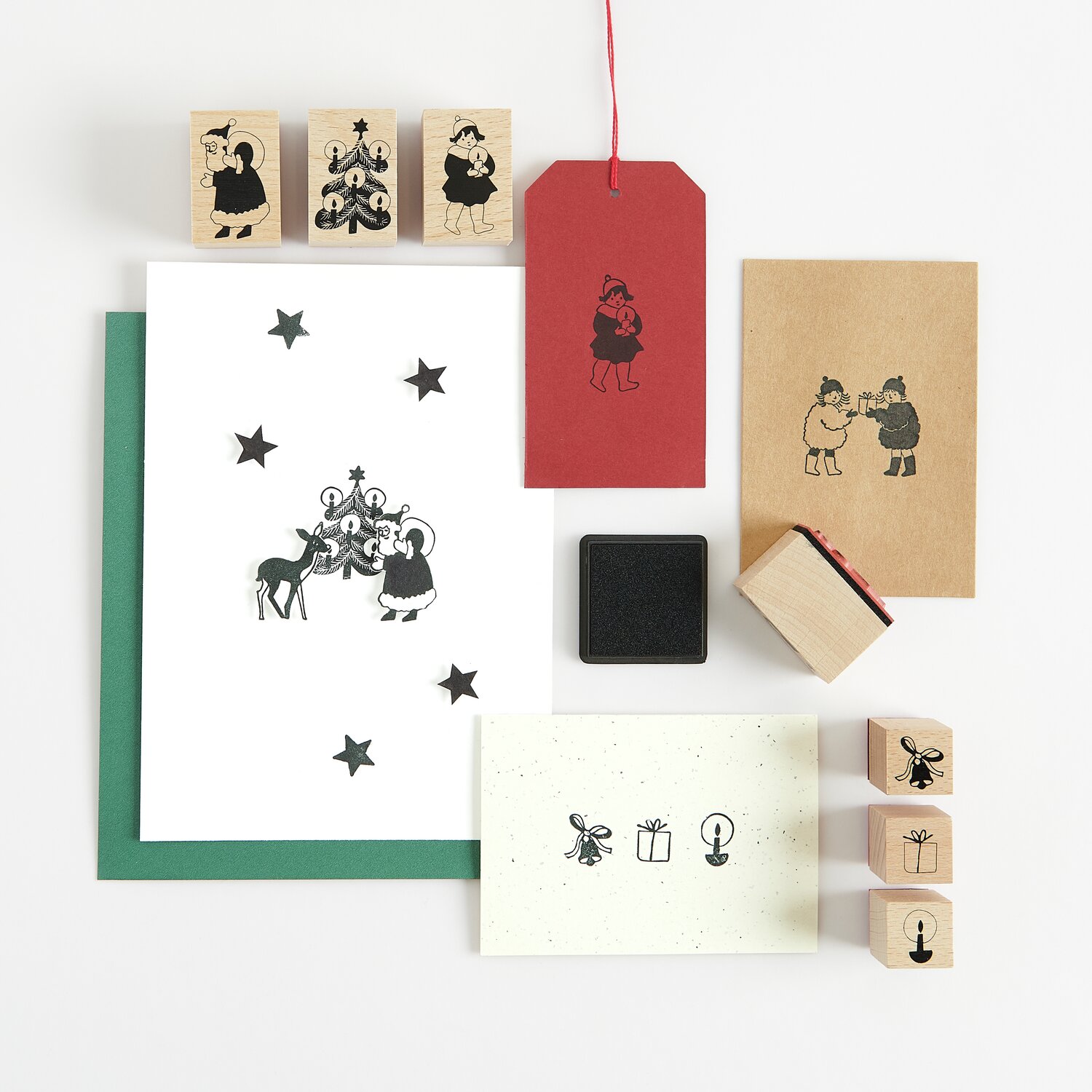 Stempelset Kids, 14-teilig, mit weihnachtlichen Motiven, inklusive Karten und Etiketten.