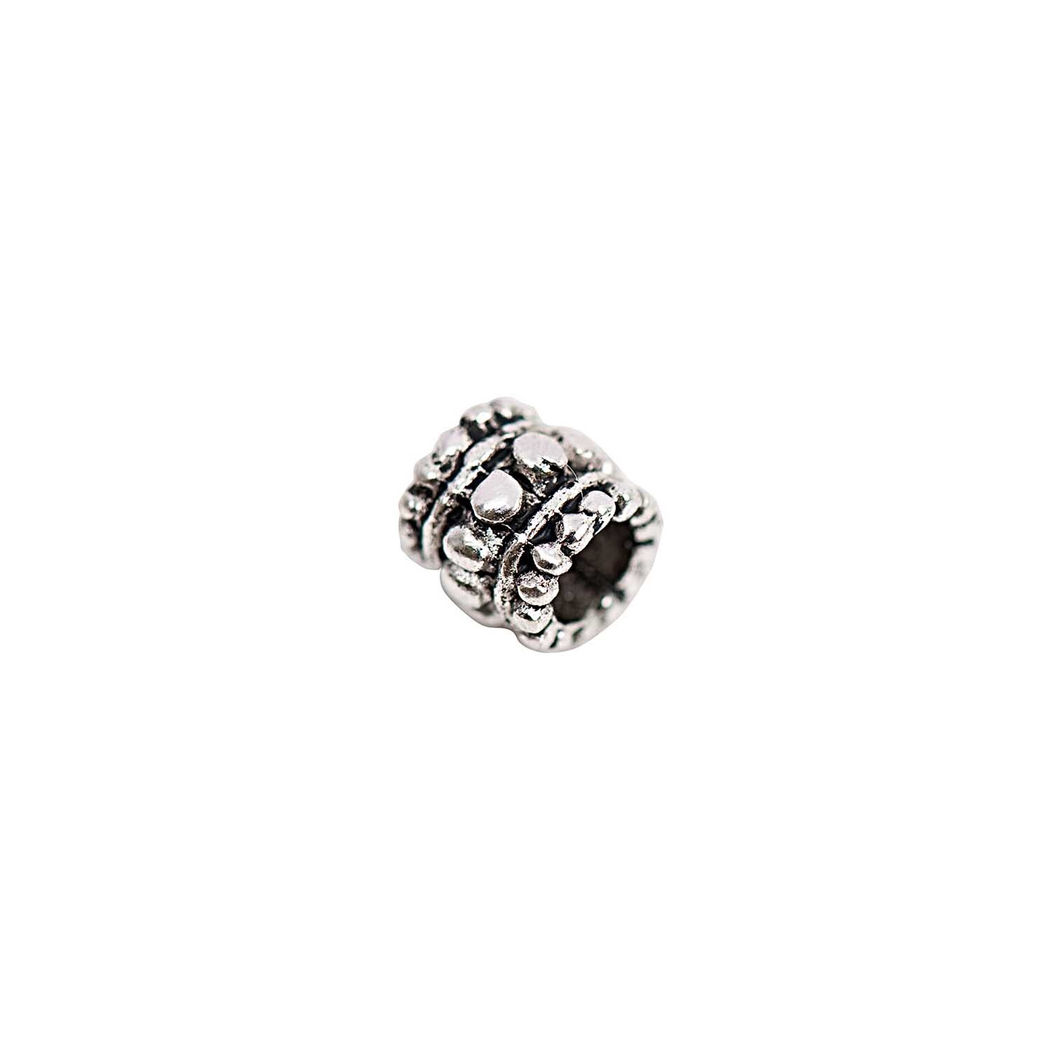Perle Ornament silber 6x7mm 10 Stück von Rico Design. Detailreiches, silbernes Perlenornament mit dekorativen Mustern. Ideal für Schmuckdesign.