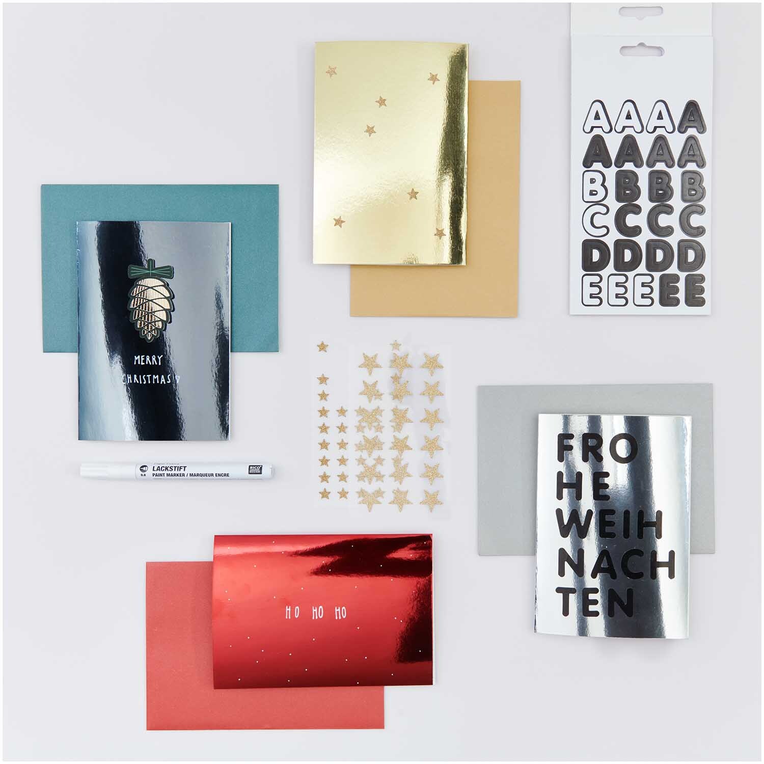 Paper Poetry Kartenset Spiegelkarton in festlichem Design mit goldenen und silbernen Akzenten. Enthält Buchstabensticker und Sternendekorationen.