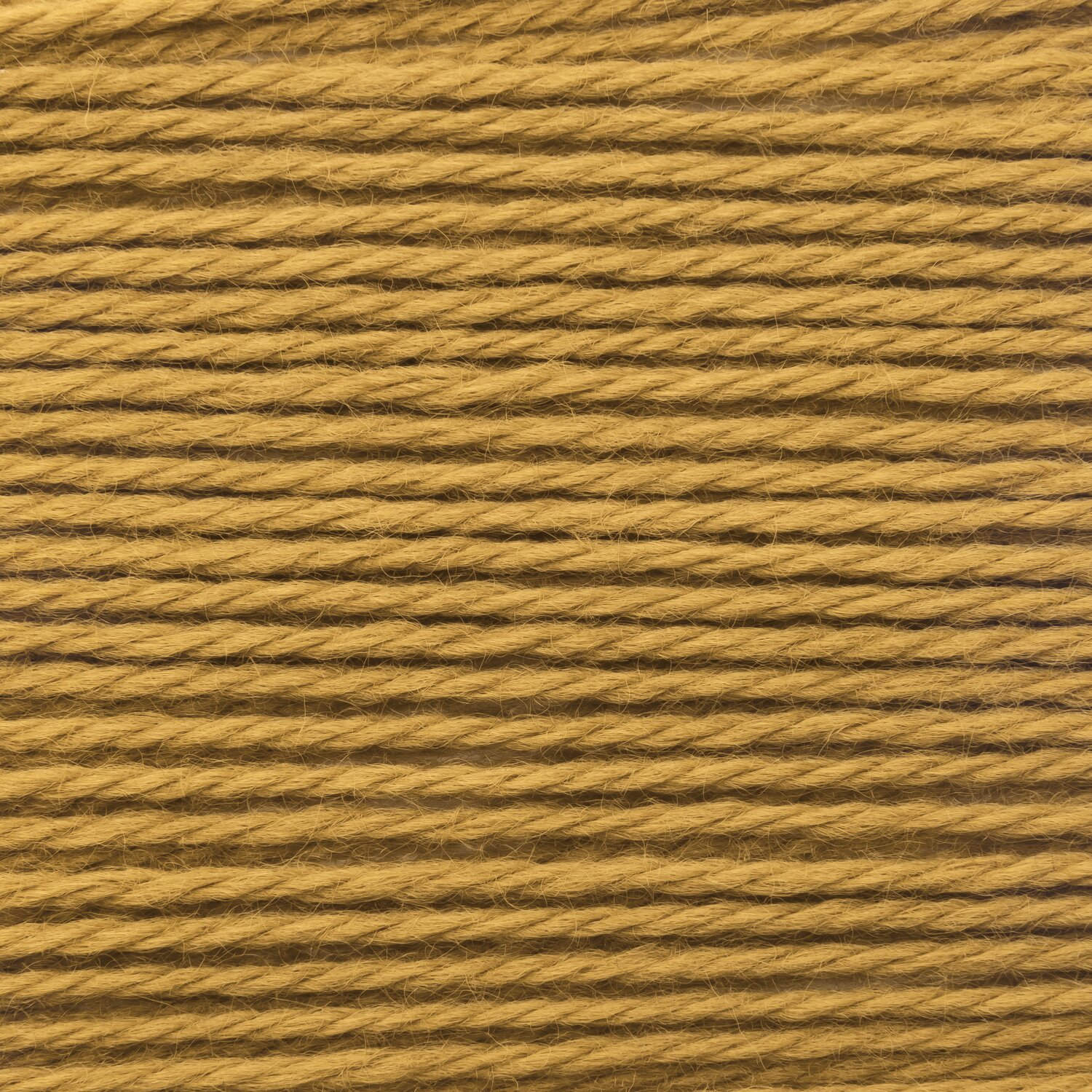 Wickelkarte des Garns Essentials Merino Plus dk in der Farbe 017 Senf.
