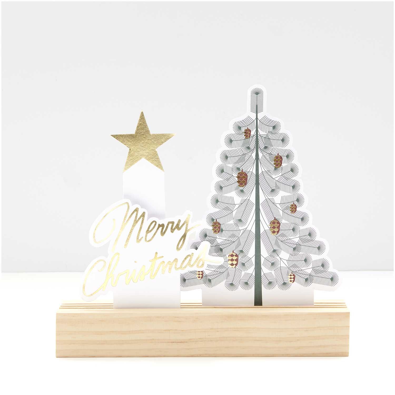 Paper Poetry Kartendeko-Set mit Tannenbaum-Design auf Holzsockel, verziert mit goldenen Details und einem Stern, von Rico Design.