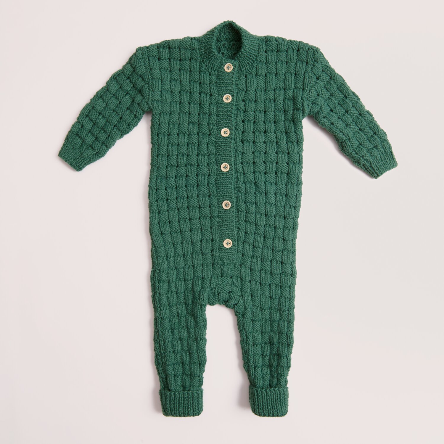 Rico Baby 044 Rico Baby Dream dk uni - A Luxury Touch, gestrickter einfarbiger Overall in Efeuton mit Strukturmuster, langen Ärmeln, Beinen und Knopfleiste, 50g 115m