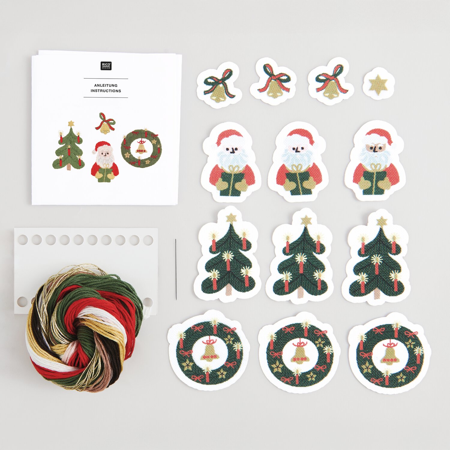Stick & Stitch Stickpackung Weihnachtsmann 13 Stück mit buntem Garn und weihnachtlichen Motiven von Rico Design. Ideal für festliche Dekorationen.