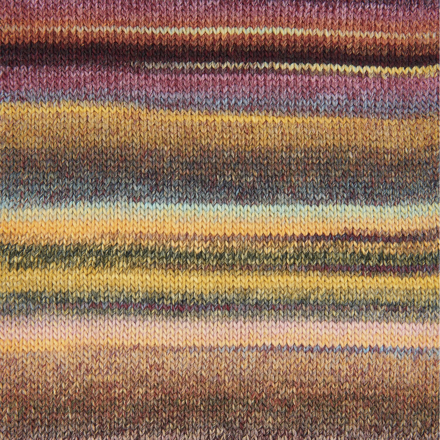 Creative Melange chunky, gestricktes Garnmuster in warmen Tönen, ideal für Strickprojekte.