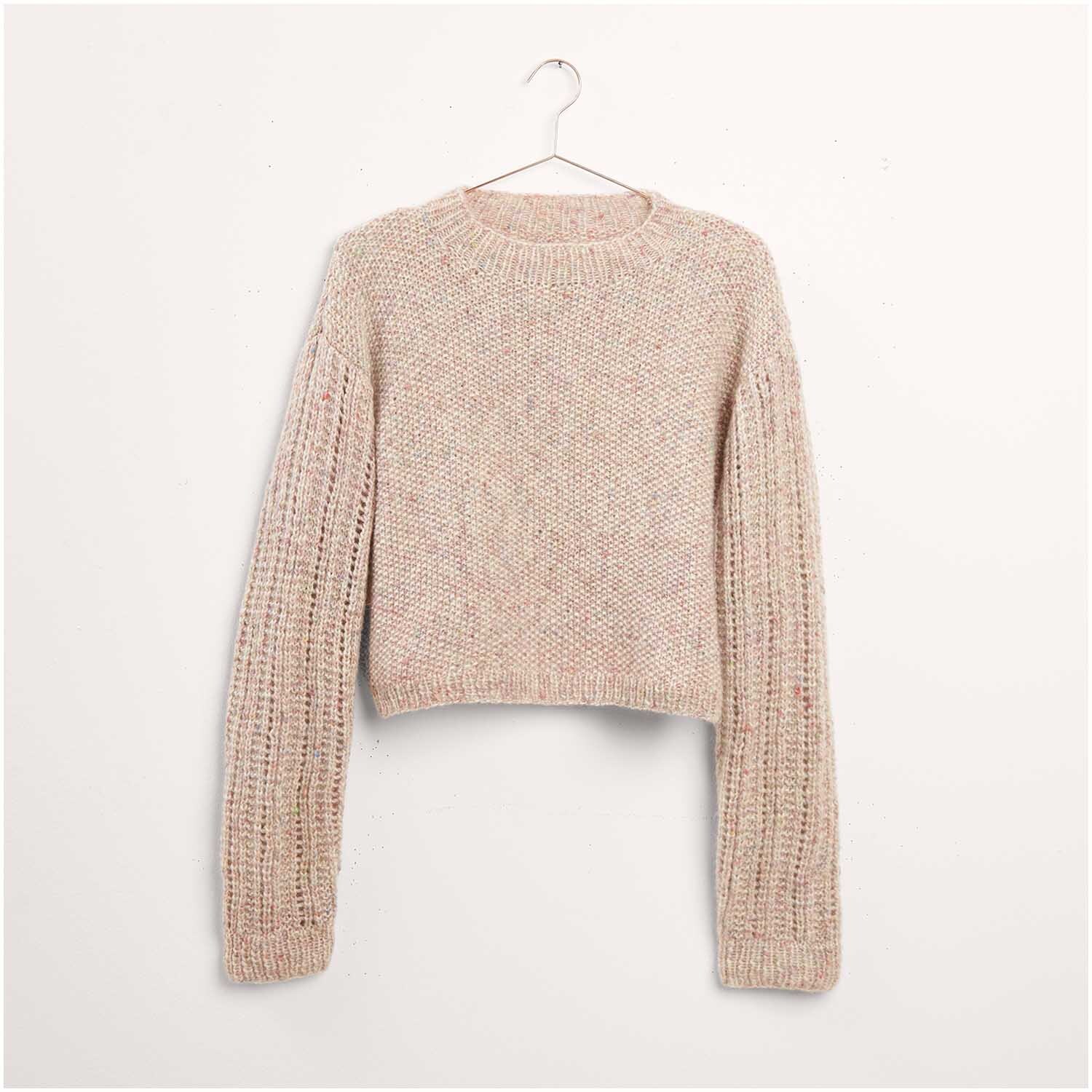Strickset Pullover Modell 11 zeigt einen eleganten Pullover aus weicher Wolle, ideal für kühle Tage. Perfekt für stilvolle Strickliebhaber.