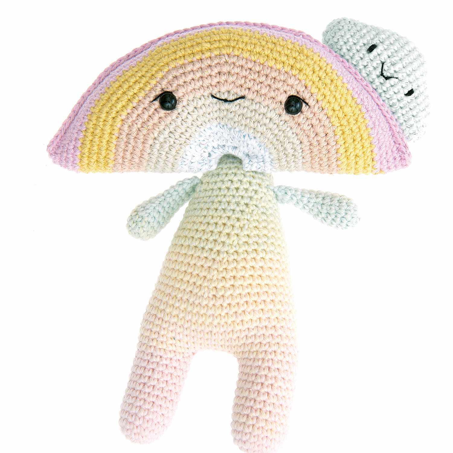 Häkelset Rainbow-Head: Ein gehäkeltes Spielzeug mit Regenbogenkopf und Wolke, aus Ricorumi Garn.