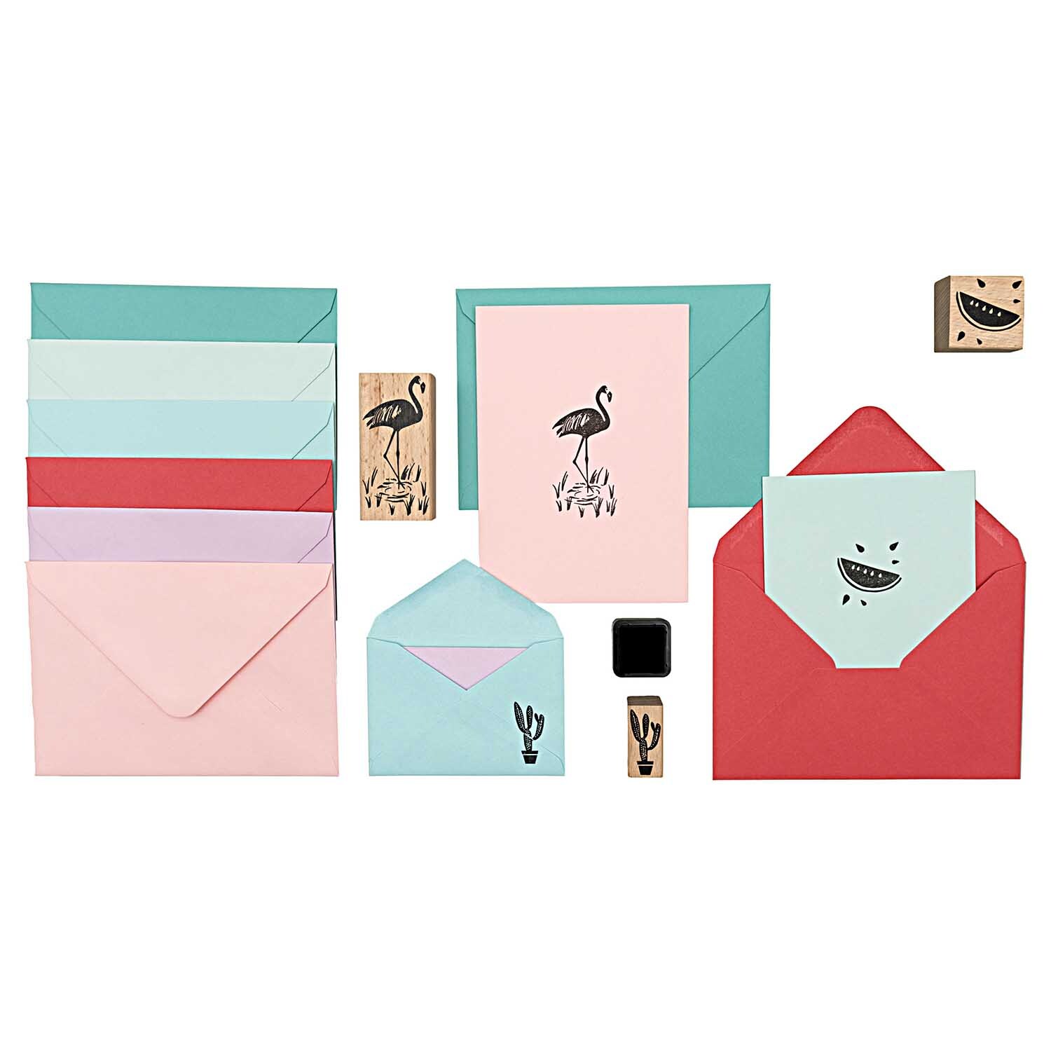 Paper Poetry Stempelset Tropical Spring Flamingo mit bunten Umschlägen und Stempeln.
