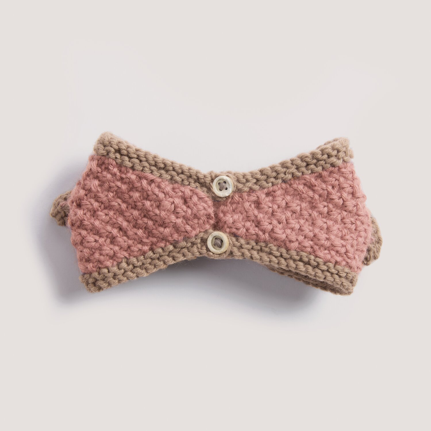 Rico Baby 044 gestricktes Baby-Stirnband mit strukturierter Mitte, kontrastfarbener Umrandung, zwei Knöpfen und weicher Wolle Rico Design, 50g 115m