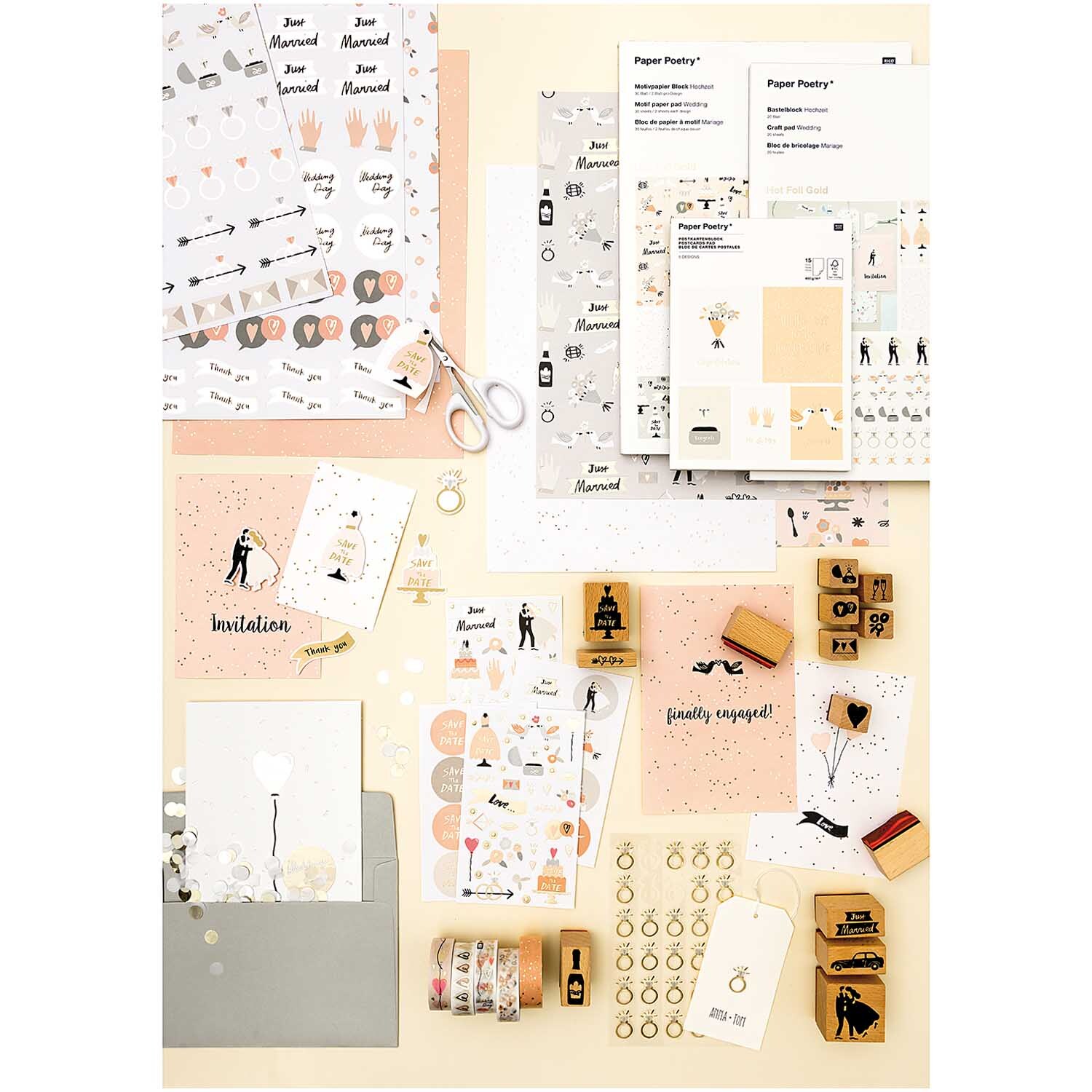 Paper Poetry Motivpapierblock Hochzeit 30 Blatt zeigt eine Auswahl an Hochzeitspapieren und Stempeln. Ideal für kreative Hochzeitsprojekte.