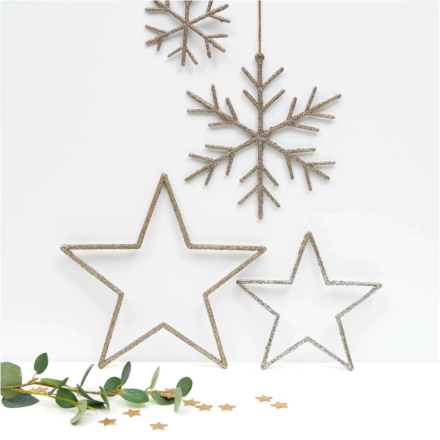 Hänger Stern mit Glitter gold: Dekorativer Sternanhänger von Rico Design in funkelndem Goldton.