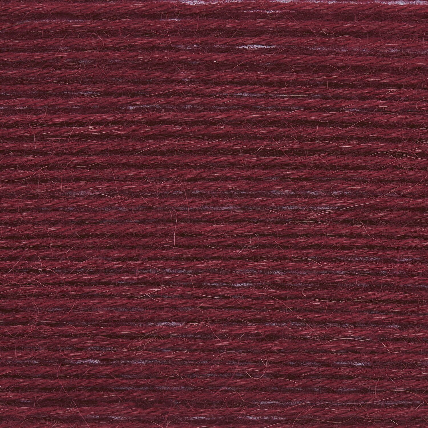 Wickelkarte des Garns Socks Alpaca Luxury 4-fädig in der Farbe 003 Bordeaux.