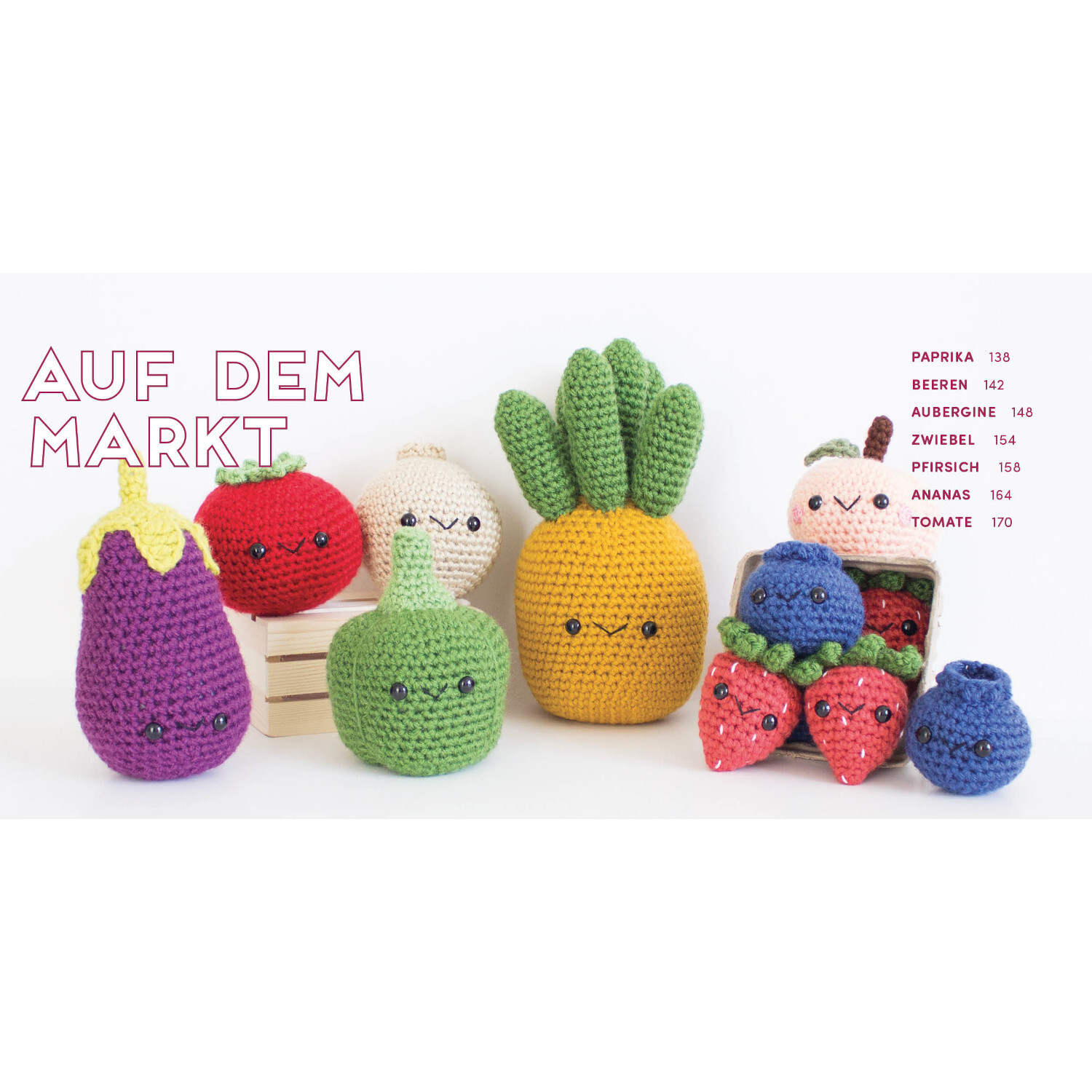 Meine kunterbunte Amigurumi-Welt: Bunte gehäkelte Gemüse- und Fruchtfiguren auf weißem Hintergrund.