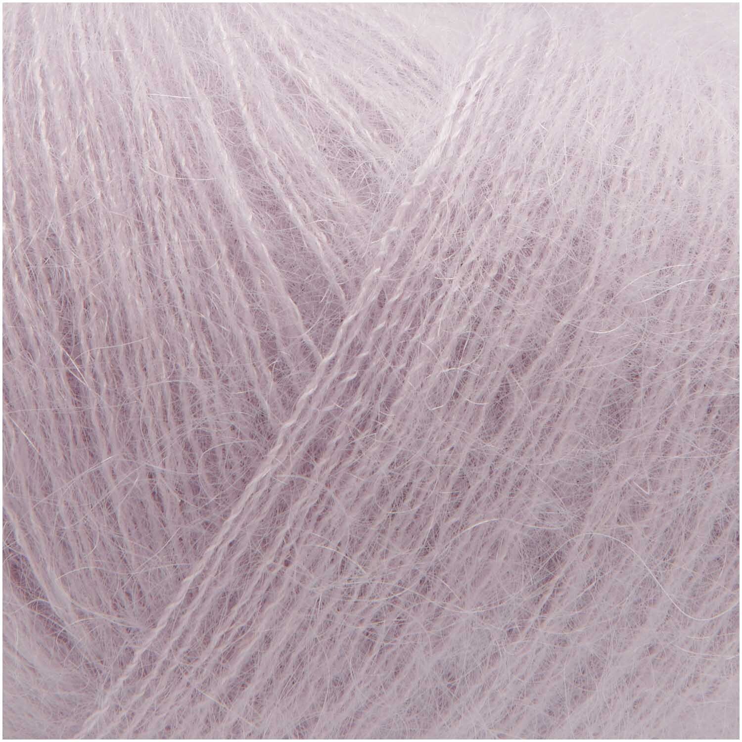 Essentials Super Kid Mohair Loves Silk: Weiches Garn in blasslila von Rico Design, ideal für leichte Strickprojekte.