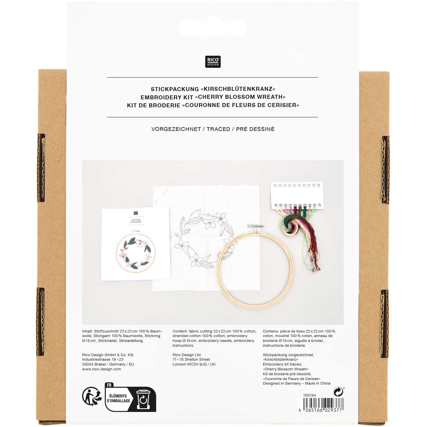 Stickpackung Kirschblütenkranz vorgezeichnet von Rico Design, zeigt Stickrahmen und Garn auf weißem Hintergrund.