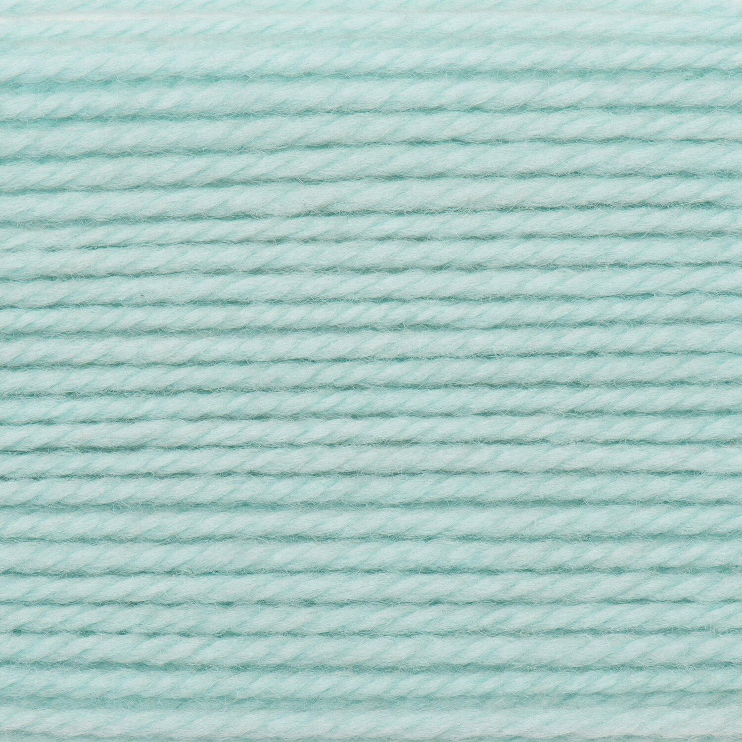 Wickelkarte des Garns Essentials Soft Merino aran in der Farbe 104 Jadegrün.