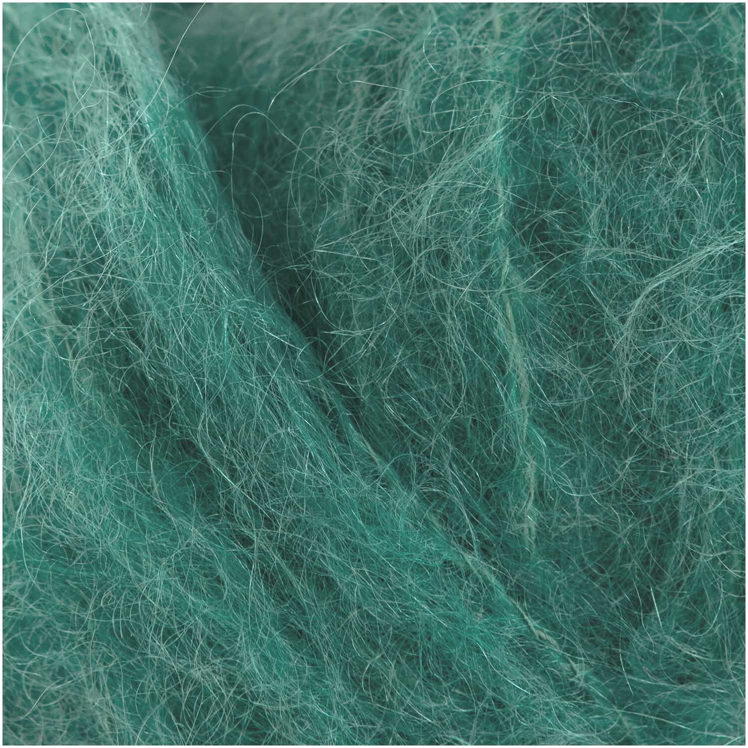 Fashion Mohair Merino Chunky: Weiches, grünes Garn von Rico Design, ideal für warme Strickprojekte.