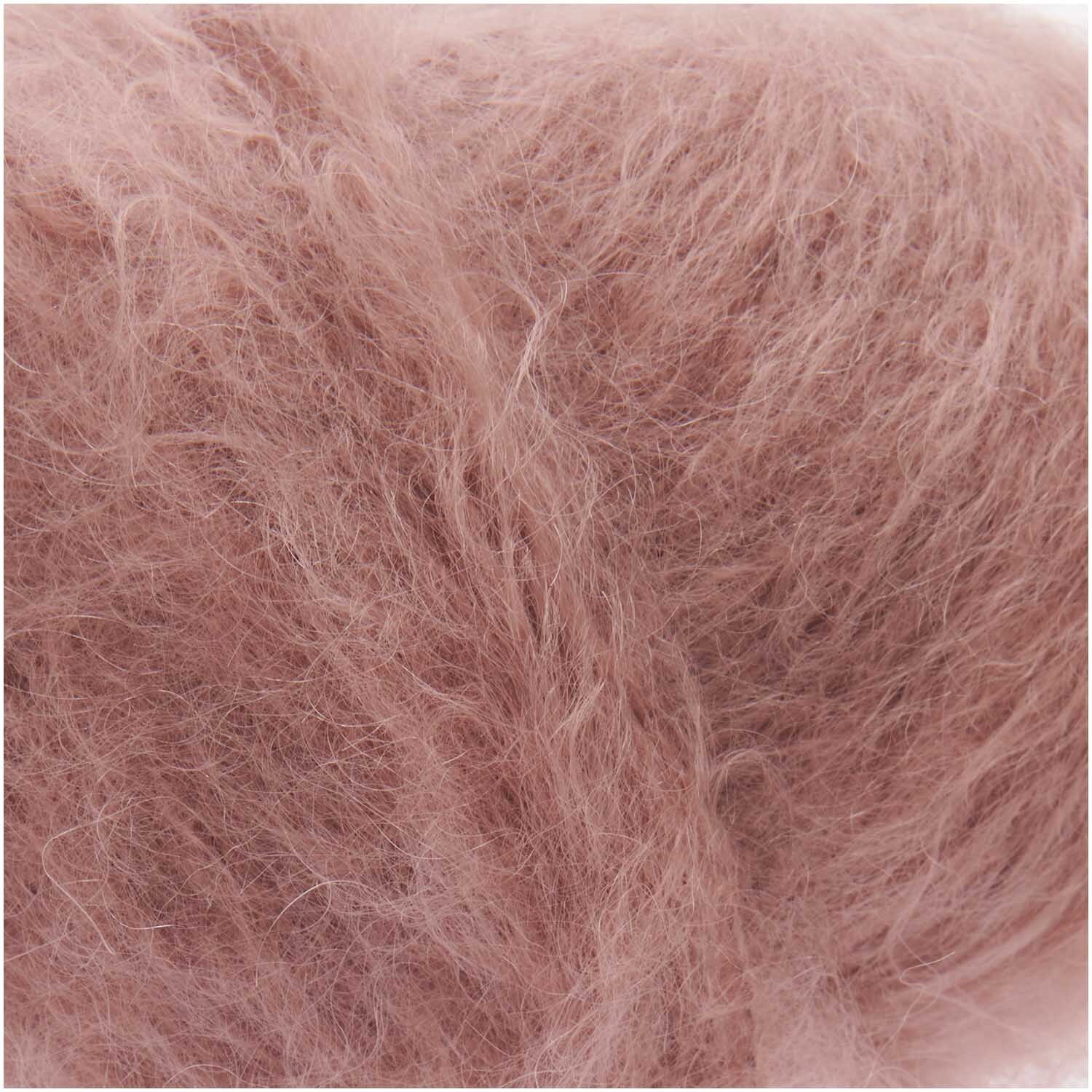 Fashion Mohair Merino Chunky: Weiches, flauschiges Garn in Mauve von Rico Design, ideal für Strickprojekte.