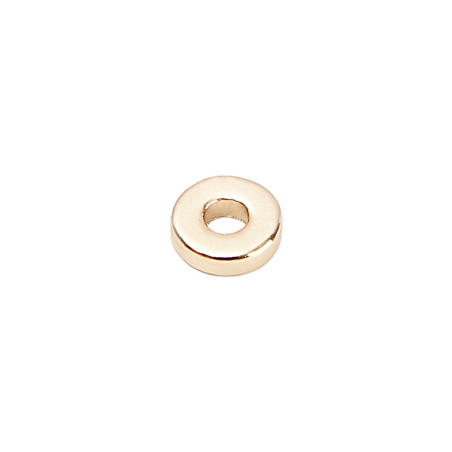 Scheibe rund gold 6mm 35 Stück von Rico Design. Abgebildet ist eine einzelne goldene Scheibe mit Loch in der Mitte.